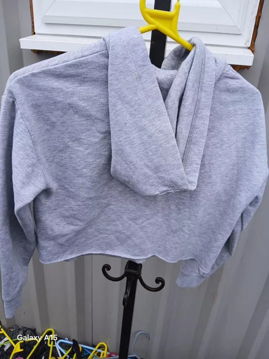 a grey cropped hoodie